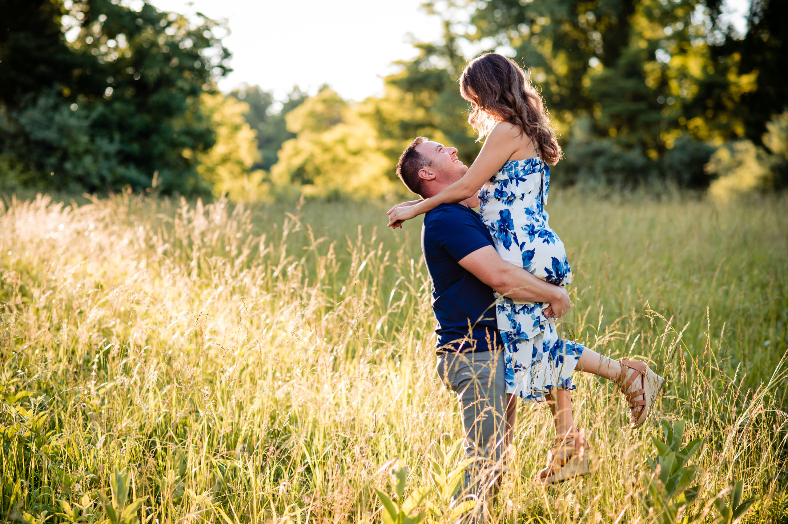 Couple dancing in field