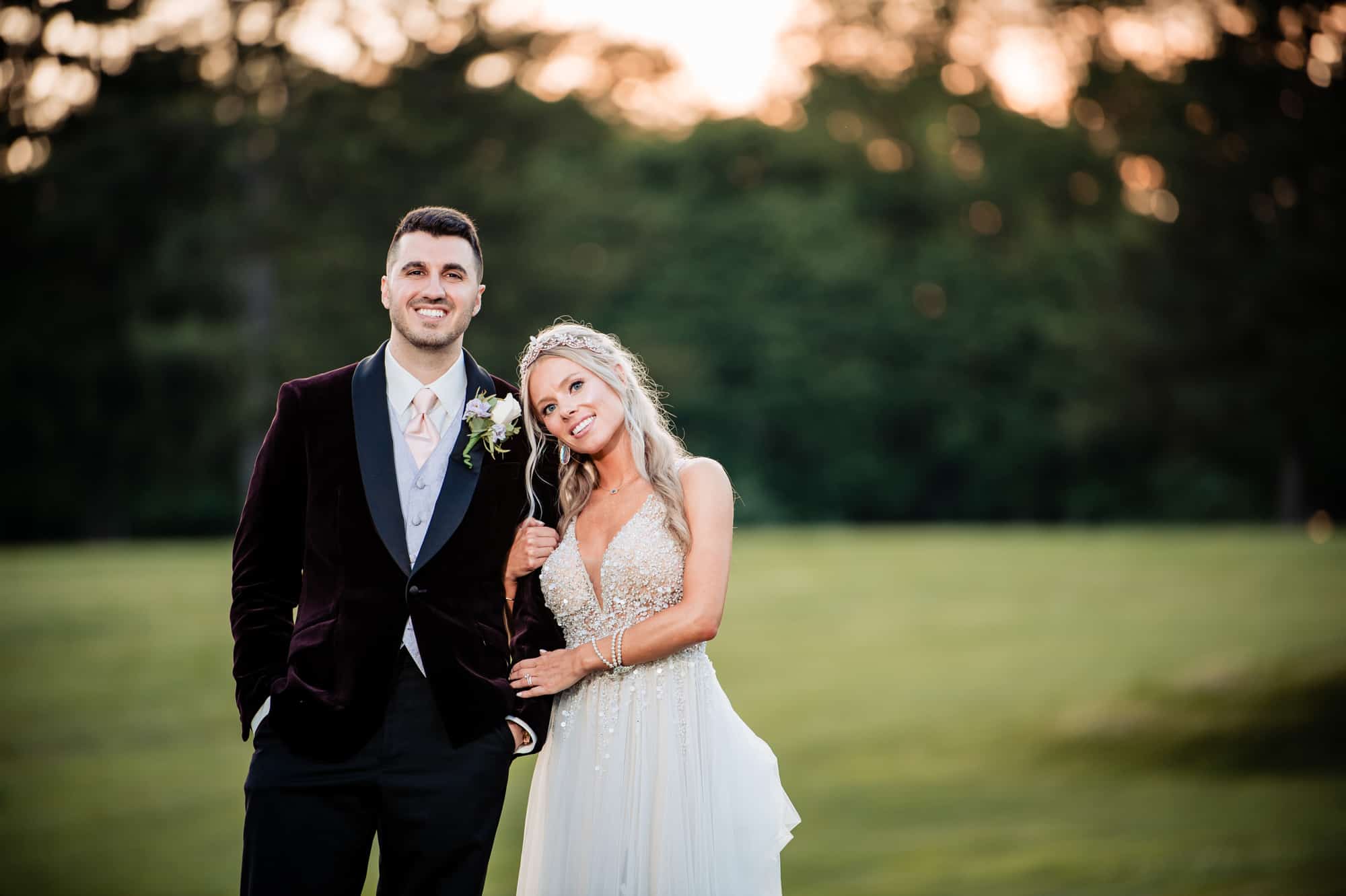 Couple looking at camera on wedding day