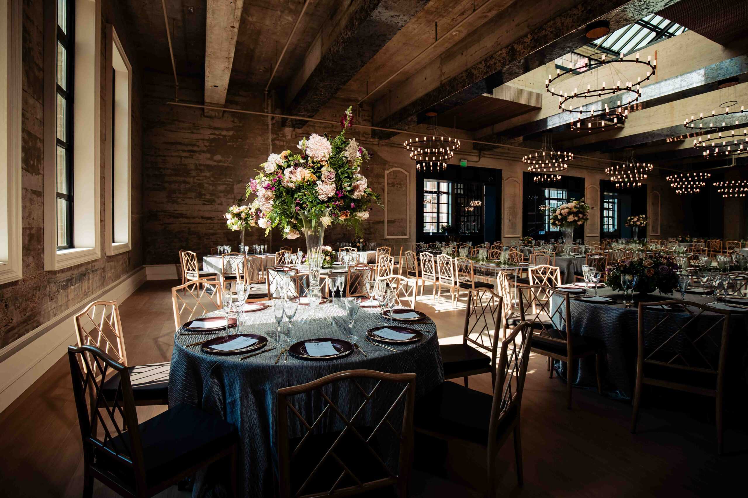 Reception space with tables at Cescaphe's The Switch House at the Battery